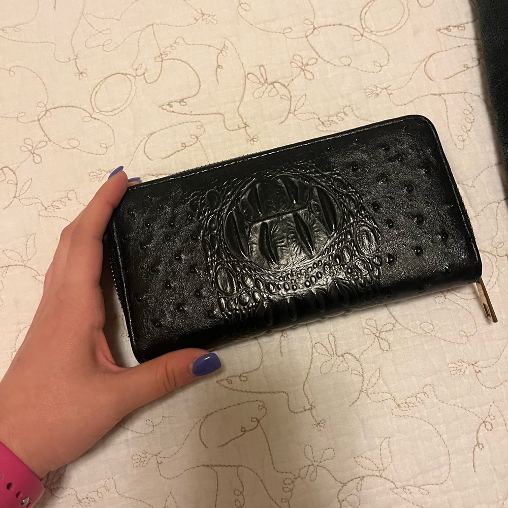 Black embossed leather wallet